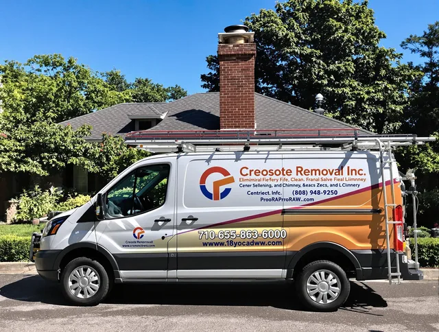 East Lyme Chimney Sweep technician removing creosote safely in East Lyme, CT